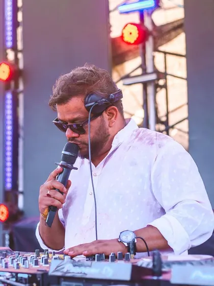 On the mic during my Holi set, connecting with the thousands of people in the crowd.