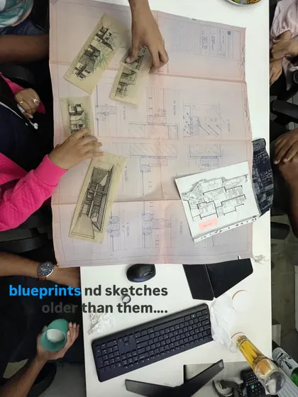 blueprints and sketches older than them… sharing the history of the practice with younger architects.