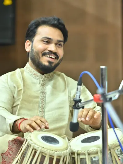 Pictures from the Komal Nishad concert, providing tabla accompaniment for Pandit Debashish Bhattacharya ji on the slide guitar.