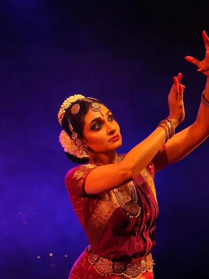 A graceful pose from the KalaNadam Festival, capturing the essence of a traditional Margam performance.