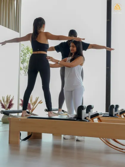 Duet sessions are about community and shared goals. Here, I'm guiding two clients as they work in sync on the Reformers, building strength and balance together.