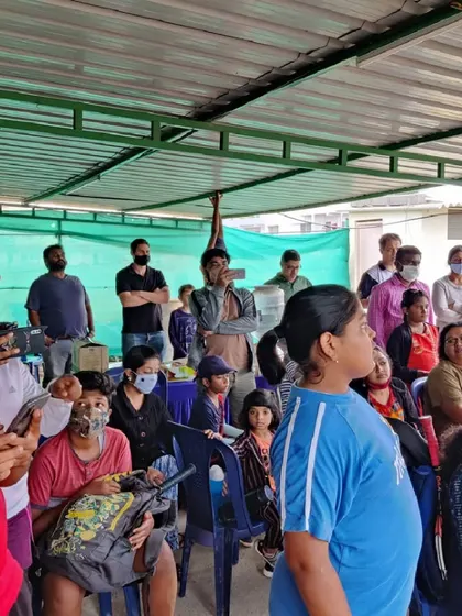 The crowd watches on during the tournament awards ceremony. We believe in celebrating every player's effort and creating a strong community spirit.