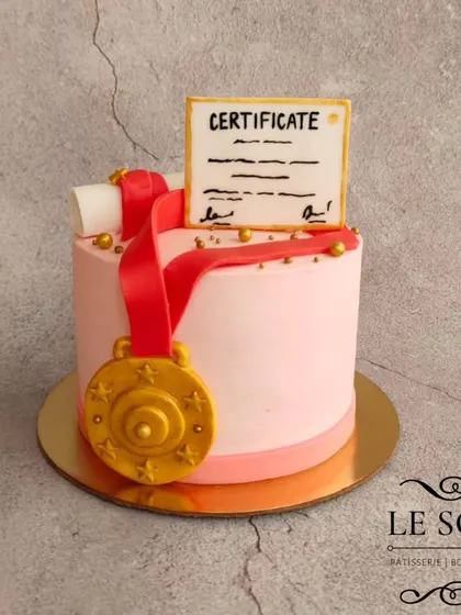 A celebration cake for any achievement. This half-kg Mango cake is decorated with a fondant gold medal and a certificate to say "Congratulations."