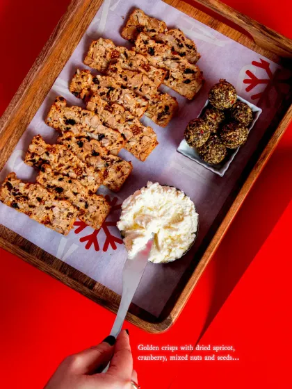 A top-down view of the platter, showcasing the golden crisps, creamy cheese, and savoury truffle balls. This is what a well-planned party spread looks like.