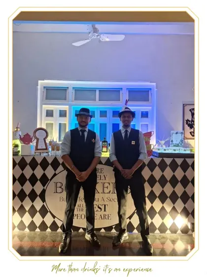 Our bartenders dressed for a whimsical "Alice in Wonderland" themed event. We fully commit to themed parties, with our staff and bar design matching the client's creative vision.