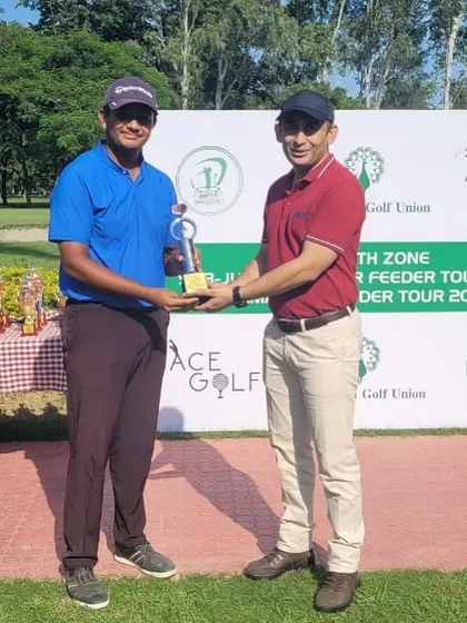 A Student Receiving a Trophy for Back-to-Back Wins: We celebrate Raunik Kharkwal's back-to-back victories, clinching the Amateur North Zone Feeder Tour title and securing 2nd place at the Lt. Governor’s Cup. A truly outstanding achievement.