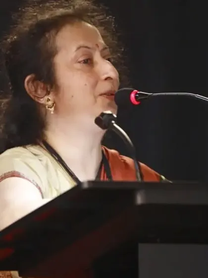 A speaker presents at our conference on "Puppet Traditions & Innovations". These academic sessions are crucial for documenting and discussing the evolution of puppetry as a visual theater form.