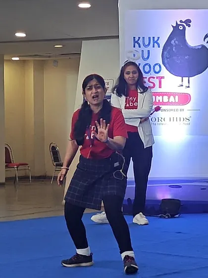Two of our teachers performing a scene from a story. Their expressive faces and body language are key to our storytelling, capturing the attention of even the youngest audience members without complex sets or scripts.