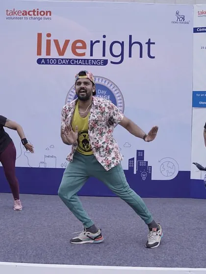 On stage for a corporate wellness event with Novo Nordisk. Leading their "liveright" challenge was an amazing experience.