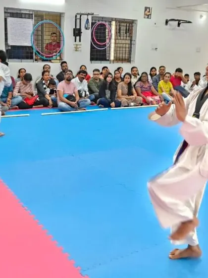 A student practices his form during the belt exam.