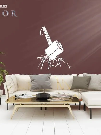 Mjolnir, Thor's hammer, shown cracking the wall. This is another great example of a 3D-effect mural that adds action to a room.