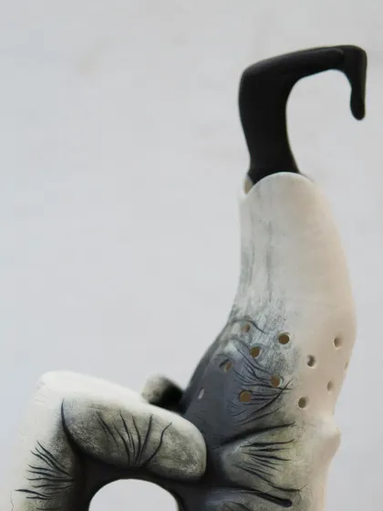 This powerful sculpture, "The Arm of a Western Hoolock Gibbon," was created by one of our foundation students. It tells the tragic true story of Kalia, the Lost Gibbon of Assam, and stands as a statement on ecosystem loss and animal abuse.