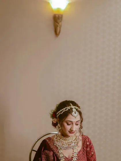 A quiet, contemplative portrait of the bride, beautifully lit from the side.