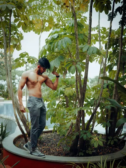 Aesthetic dreams in the making. A shirtless outdoor photo.