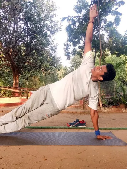 Vashishthasana, or the Side Plank Pose, is a powerful asana for building strength in the arms, wrists, and core. It teaches us that a calm mind is the source of inner strength and self-confidence, which are essential for good health.