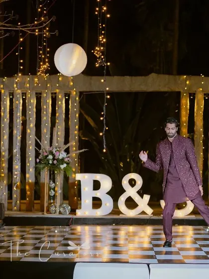 The groom takes center stage. Our clean and elegant Sangeet setup ensures that the focus remains on the performances and the people celebrating.