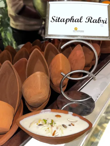 A seasonal specialty, our Sitaphal Rabri is a creamy, luscious dessert. We fold the delicate pulp of fresh custard apples into slow-reduced milk, creating a naturally sweet and fragrant treat.