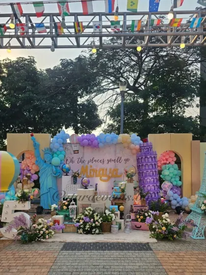 Oh, the places you’ll go! This expansive 'Around the World' themed party was a spectacular adventure, featuring global landmarks and pastel skies. It shows how I can transform a large outdoor space into a completely immersive world for your child's biggest dreams.