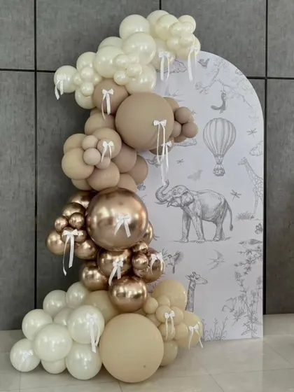 Premium and aesthetic means Bunny Bash. This backdrop with a custom animal-print design and a sophisticated balloon garland is an example of the high-quality work I deliver.