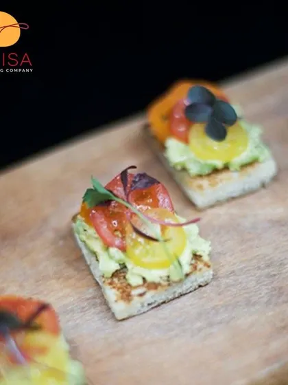 Freshness in every bite. This simple bruschetta with avocado mash and heirloom tomatoes showcases our use of quality ingredients to create flavorful and visually appealing appetizers.