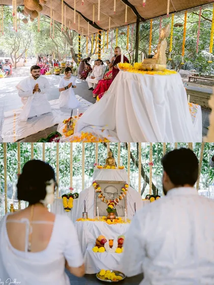 A wide shot showing the couple paying their respects at the altar during their outdoor Buddhist wedding.