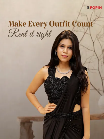 Black makes a statement. This pre-draped black saree with a heavily embroidered blouse is the perfect rental for a sangeet or cocktail night when you want drama and elegance.