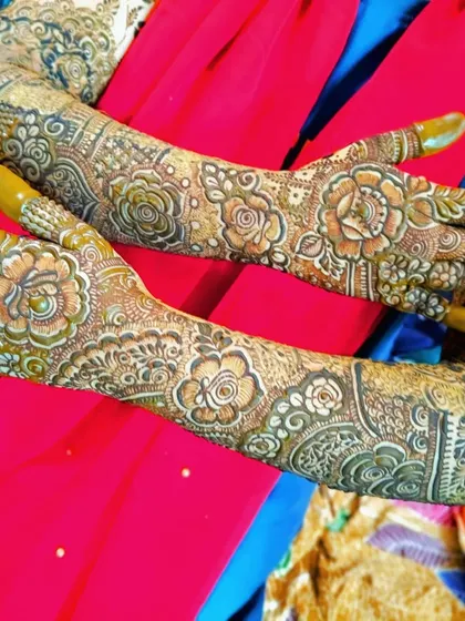 The fresh paste of a bridal design, showing the intricate details and the beautiful contrast against the skin.