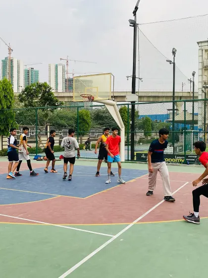 Players setting up their offense during an evening practice session.