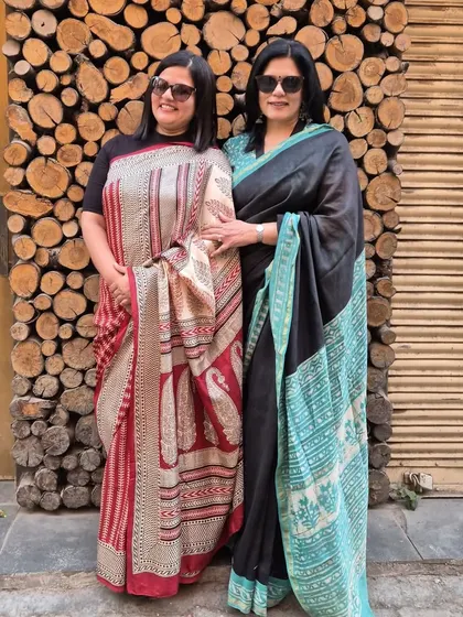 Posing with my dearest friend, Marina. We both chose to wear beautiful sarees for our meetup, celebrating our friendship and our shared love for this timeless garment.