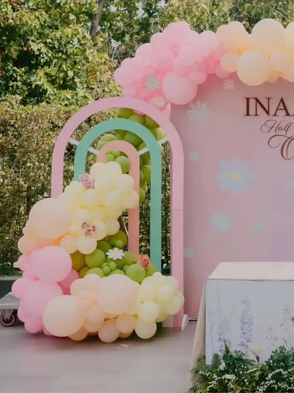 Celebrating "Half way to One" for Inaaya with a lovely pastel and daisy-themed setup, perfect for a 6-month milestone.