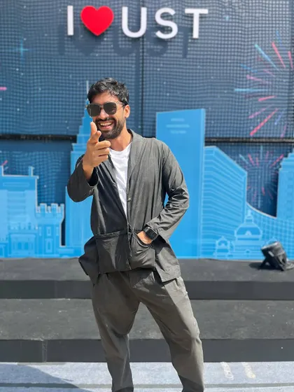 Bringing the energy before my performance at the UST event. It's all about connecting with the audience, even before I step on stage.