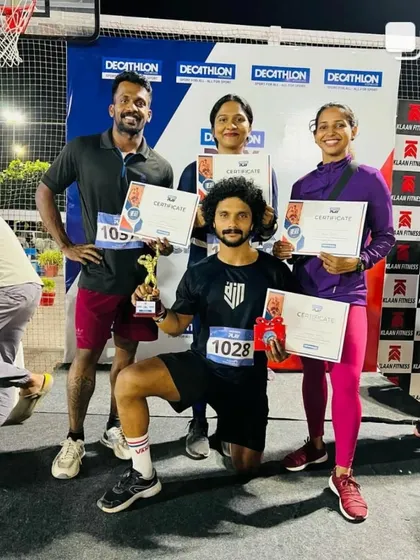 Celebrating with my team after a successful performance at the Fitmax Challenge. Competing in fitness events helps me test my limits and inspires me to keep pushing forward.