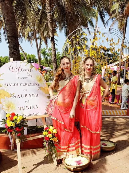A duplicate image of our Russian artists at a Haldi ceremony in Goa, showing their versatility.