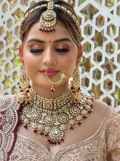 A serene, eyes-closed shot to highlight the beautiful, blended eyeshadow and long, fluttery lashes.