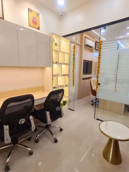 An overall view of my new office space. The layout is open and ensures a smooth flow of energy. The design combines modern aesthetics with Vastu principles to create a productive and prosperous workspace.