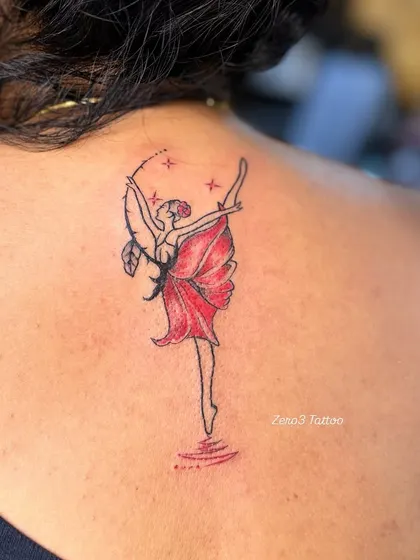 Another shot of the dancer tattoo, showing the subtle red coloring.