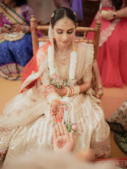 The Kanyadaan ritual, a poignant and emotional moment as the bride's hand is placed in the groom's.