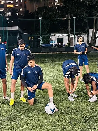 More images showcasing our dedicated coaching team during their own training sessions, meetings, and practice games.
