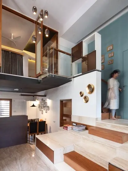 We see architecture as a tool for connection. In this residence, we used split levels and a floating bridge to link different living zones, creating visual interest and encouraging interaction between spaces while maintaining an open, airy feel.