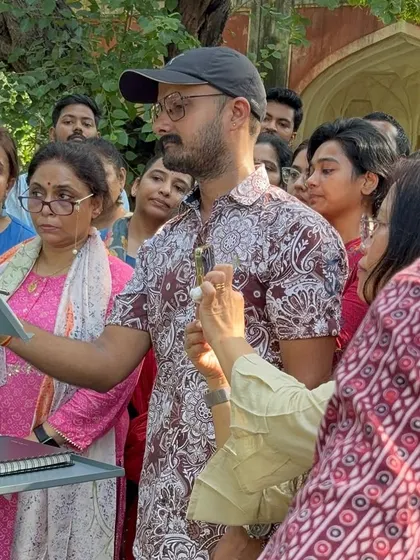 A close-up of my live sketching demonstration for the Urban Sketchers Delhi group, with participants watching closely.