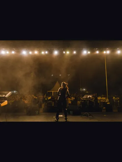A view from my perspective on stage. Looking out at the crowd and the lights before a song begins is a moment filled with anticipation.