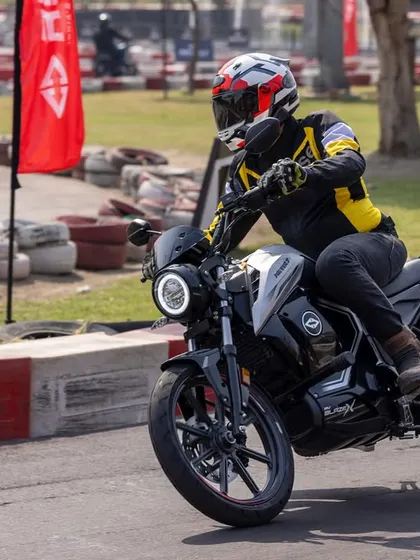 A tight shot of a rider cornering, highlighting the bike's agility. My automotive photography focuses on details that appeal to enthusiasts and potential customers.