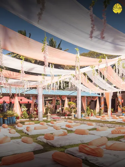 For a more relaxed and communal feel, we can arrange for low seating with comfortable cushions on our lawns, perfect for a casual mehendi or sangeet ceremony.