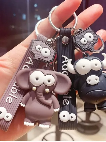 Add a bit of fun to your keys or bag with these quirky silicone keychains. This close-up shows the great quality and fun designs of the elephant and bull figures, complete with googly eyes.
