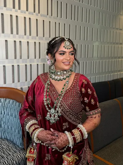 My gorgeous bride Chandni, looking serene and beautiful on her wedding day. She wore a deep velvet lehenga, so we balanced it with a soft glam makeup look, focusing on glowing skin and defined eyes.