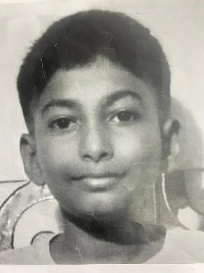This is the original photograph the student used as a reference for his self portrait. We teach our students how to translate a photo into a hand drawn piece of art.