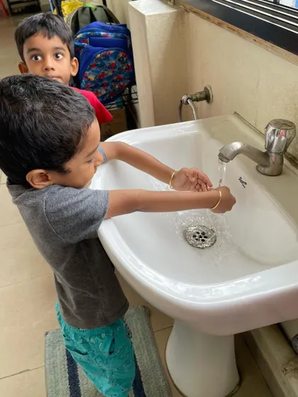 Independence in self-care is a huge confidence booster. We provide child-sized sinks and tools so children can learn to wash their hands properly on their own, fostering hygiene and autonomy.
