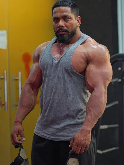 A front shot showing arm and chest vascularity.