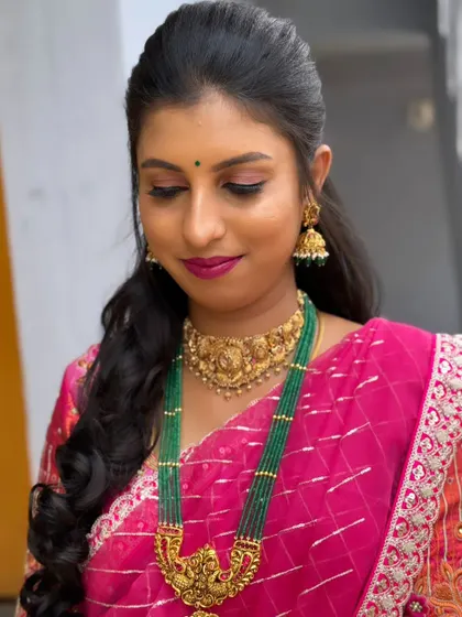 A closer look at Akshata's makeup, showing the soft eyeshadow and perfectly blended base that gives her a natural, healthy glow.