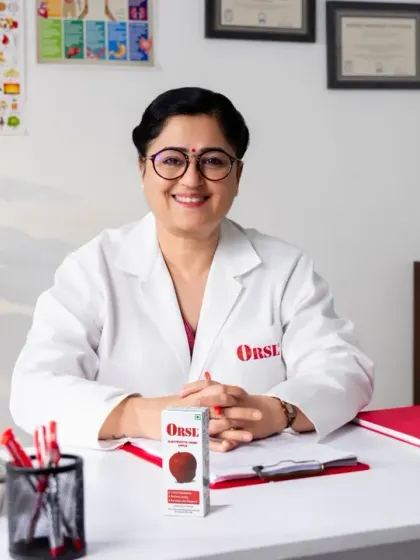 A friendly and professional portrait for an ORSL campaign. The subject is a doctor at her desk with the product, creating a trustworthy and approachable image for the brand.